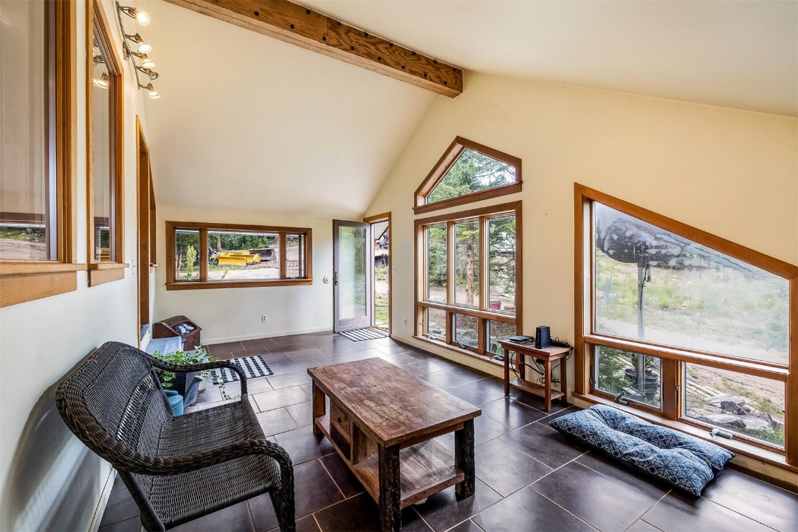 5115 Montezuma Road Montezuma, CO 80435 - Photo 11 of 35 a living room with furniture and a window