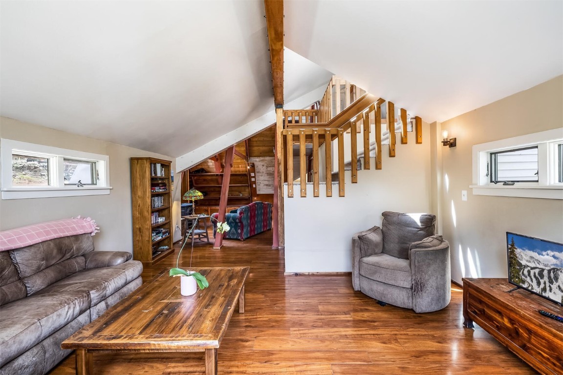 5115 Montezuma Road Montezuma, CO 80435 - Photo 19 of 35 a living room with furniture and a wooden floor
