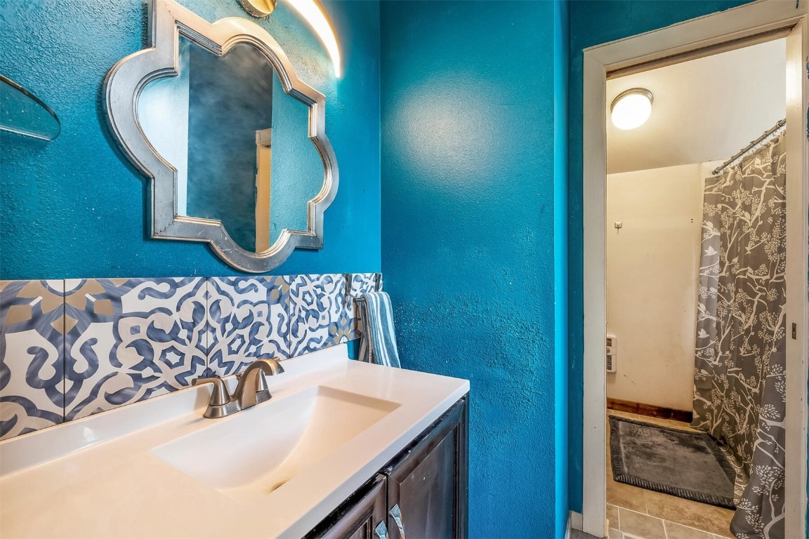 5115 Montezuma Road Montezuma, CO 80435 - Photo 26 of 35 a bathroom with a sink and a mirror