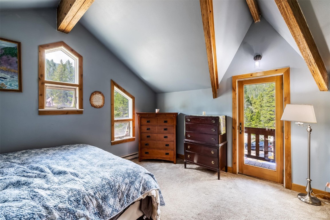5115 Montezuma Road Montezuma, CO 80435 - Photo 27 of 35 a bedroom with a bed and a window