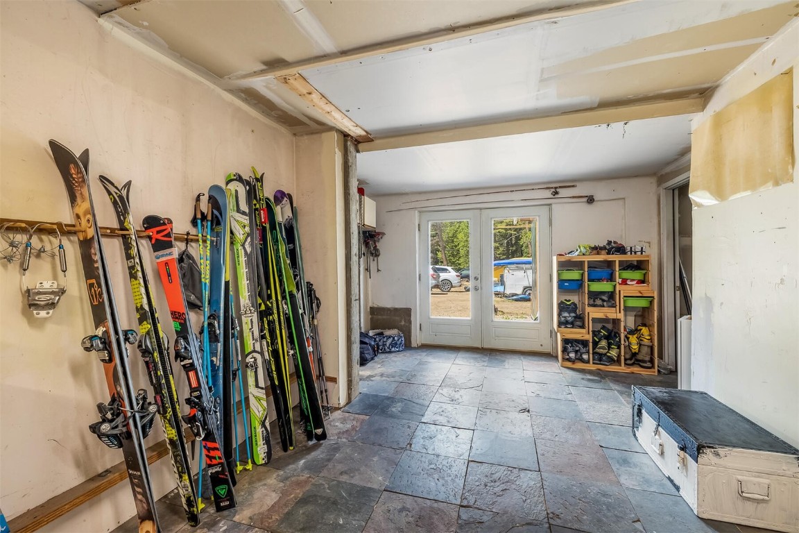 5115 Montezuma Road Montezuma, CO 80435 - Photo 31 of 35 a view of walk in closet with clothes and shoes