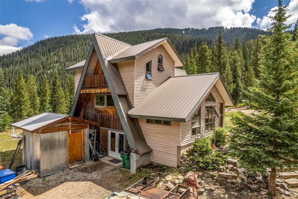 5115 Montezuma Road Montezuma, CO 80435 - Photo 7 of 35 a aerial view of a house with a yard