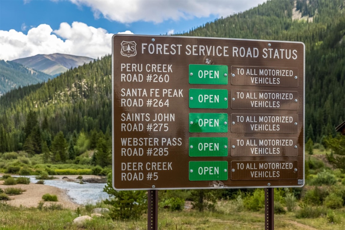 5115 Montezuma Road Montezuma, CO 80435 - Photo 9 of 35 a sign on the side of a building