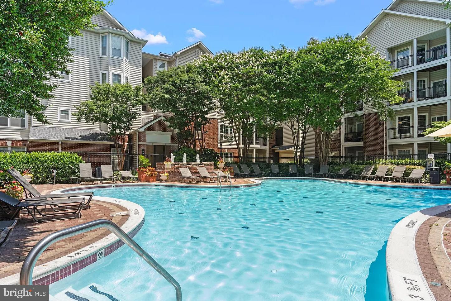 1581 Spring Gate Dr., Unit 5403 McLean, VA 22102 - Photo 14 of 20 a view of a backyard with sitting area