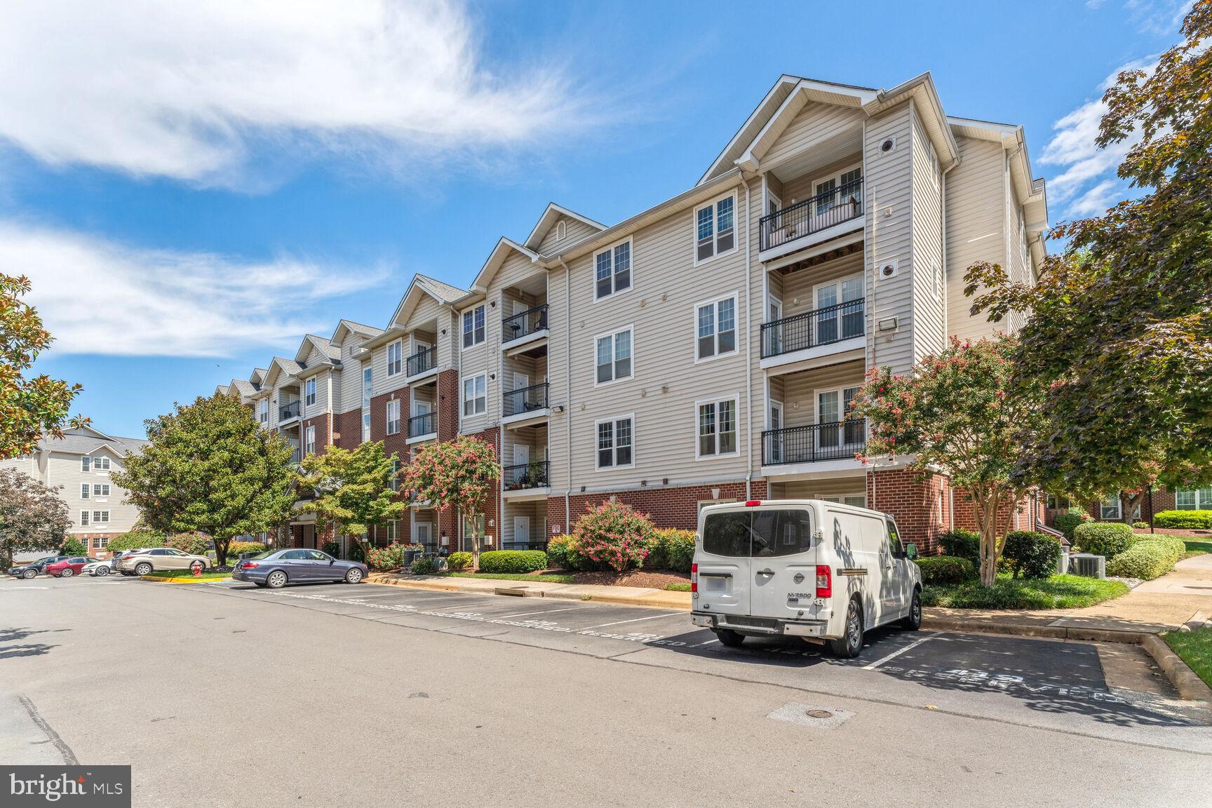 1581 Spring Gate Dr., Unit 5403 McLean, VA 22102 - Photo 20 of 20 a car parked in front of a building