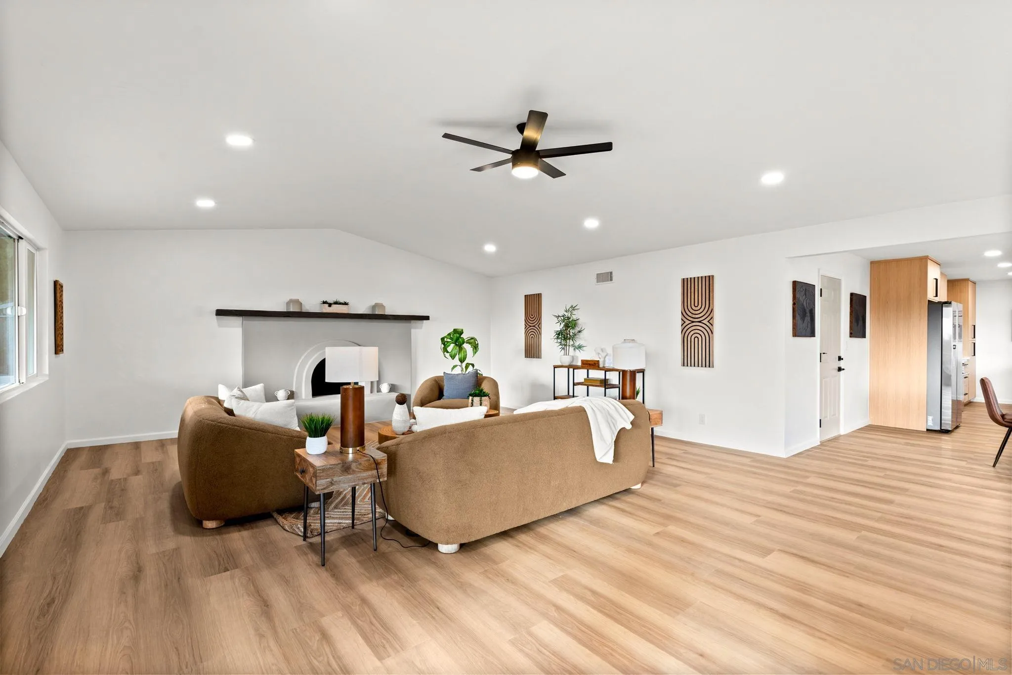 3110 Rio Madre Lane Jamul, CA 91935 - Photo 11 of 48 a living room with furniture and a wooden floor