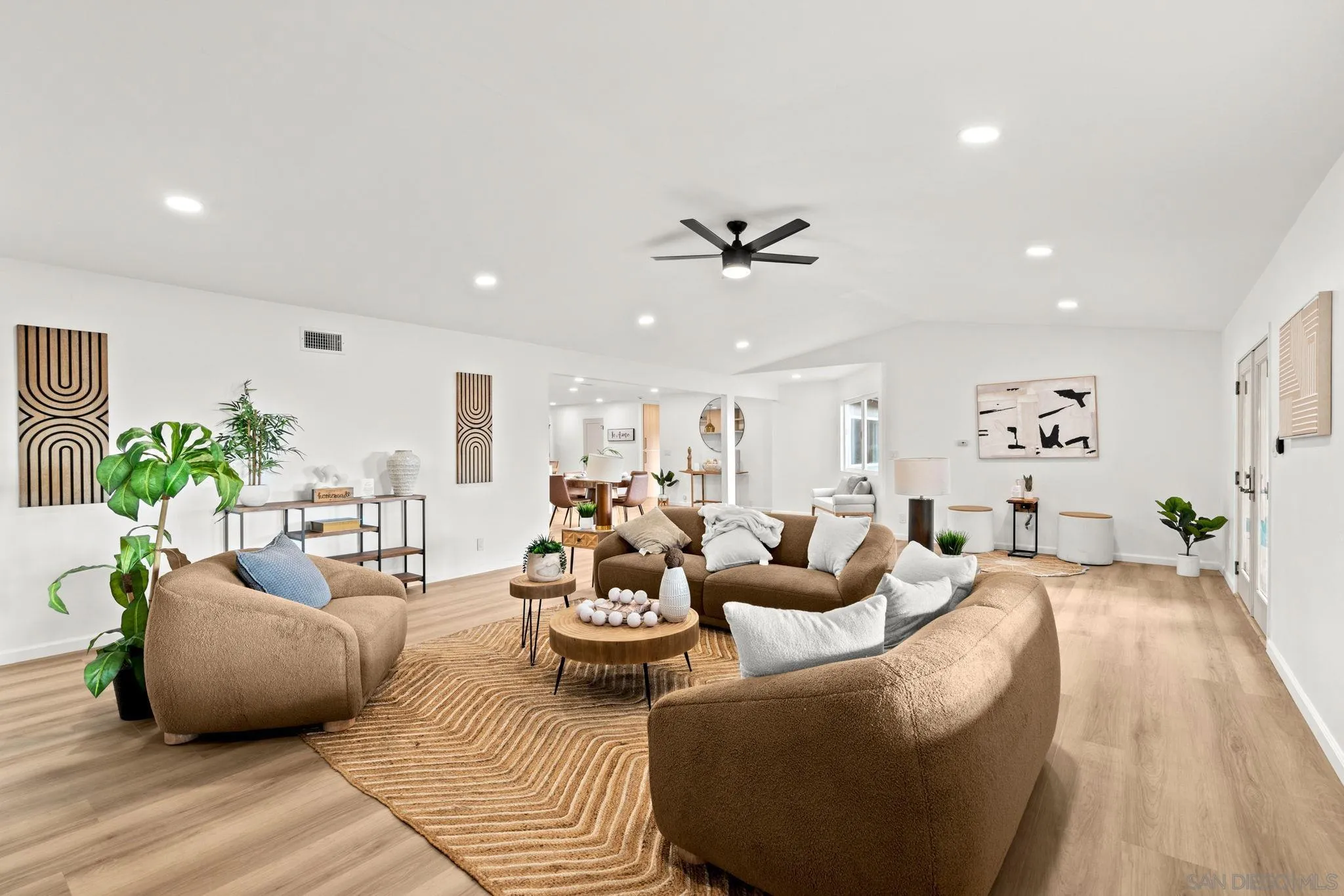 3110 Rio Madre Lane Jamul, CA 91935 - Photo 12 of 48 a living room with furniture and a chandelier