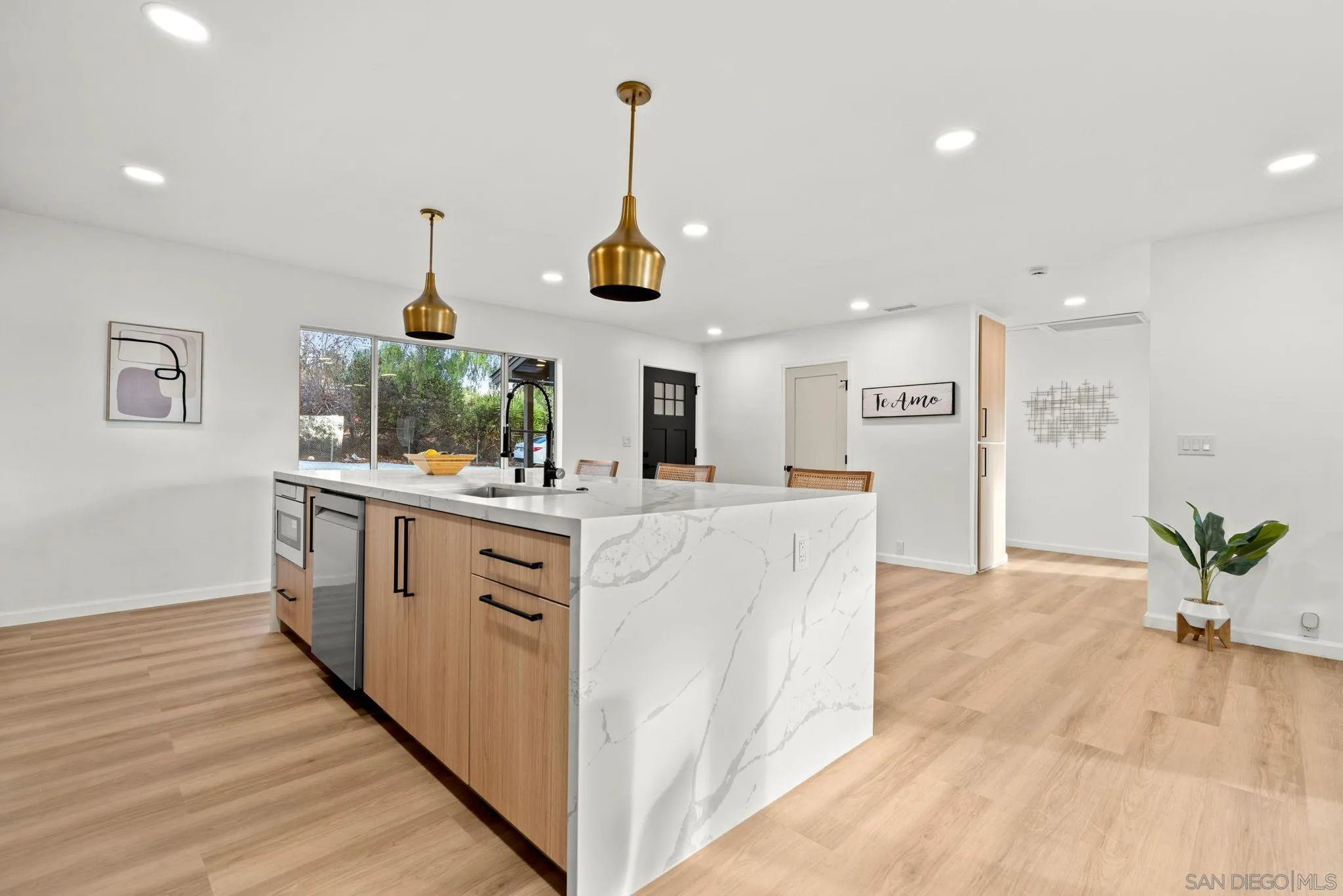 3110 Rio Madre Lane Jamul, CA 91935 - Photo 17 of 48 a kitchen with stainless steel appliances kitchen island sink stove and cabinets