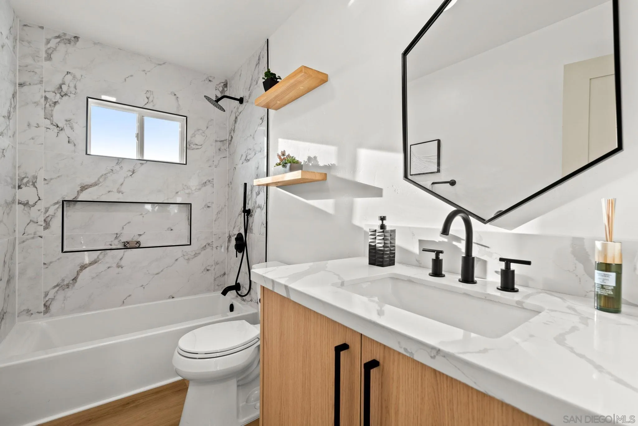 3110 Rio Madre Lane Jamul, CA 91935 - Photo 20 of 48 a bathroom with a granite countertop sink a toilet and bathtub