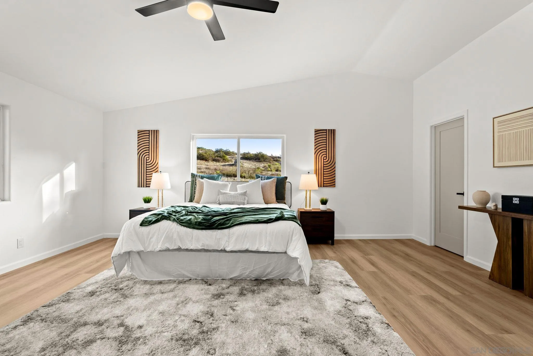 3110 Rio Madre Lane Jamul, CA 91935 - Photo 27 of 48 a bedroom with a bed and window