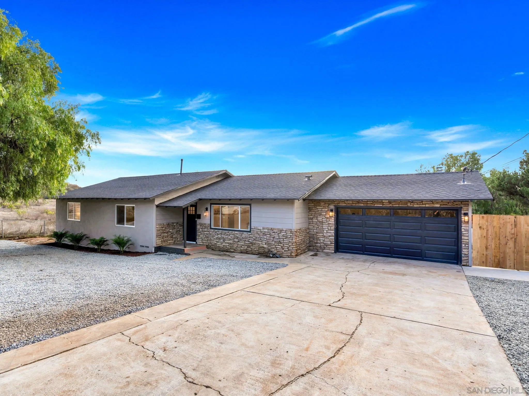 3110 Rio Madre Lane Jamul, CA 91935 - Photo 3 of 48 a view of a house with a yard
