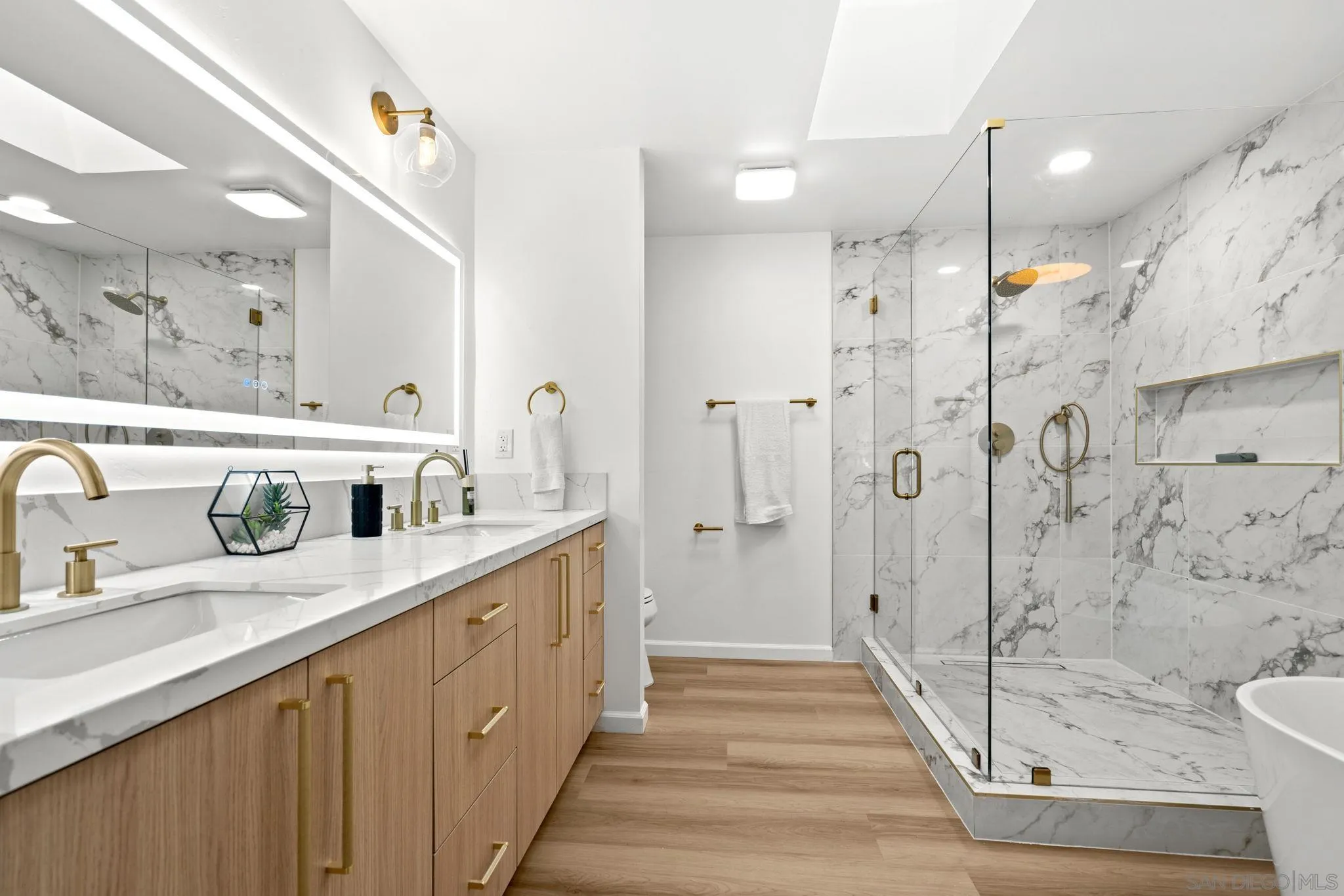 3110 Rio Madre Lane Jamul, CA 91935 - Photo 31 of 48 a bathroom with a double vanity sink mirror and shower