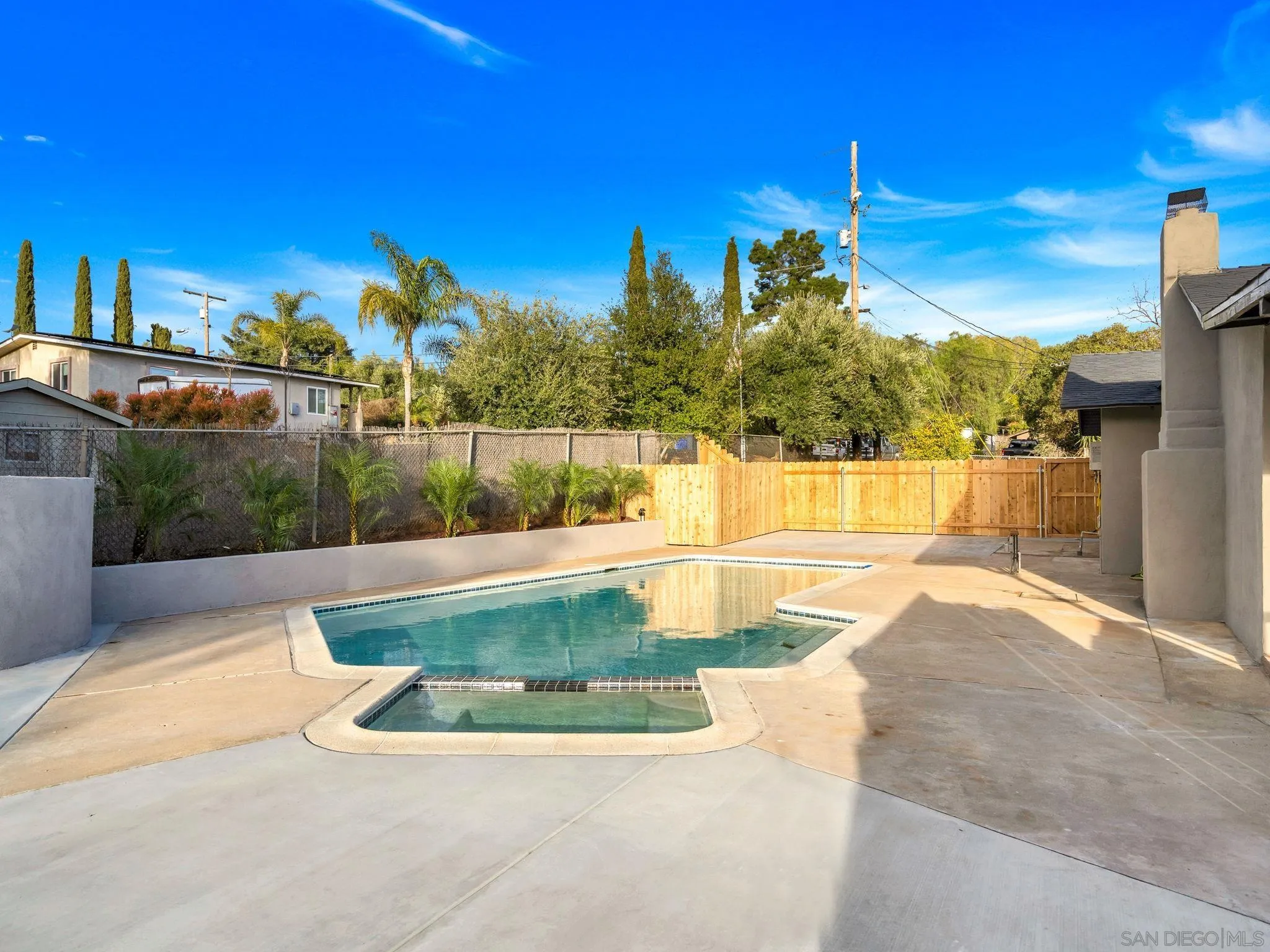 3110 Rio Madre Lane Jamul, CA 91935 - Photo 36 of 48 a view of a swimming pool with an outdoor space and seating area