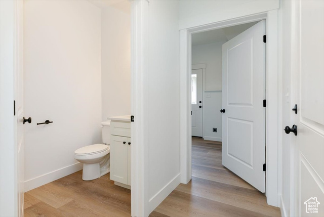 195 West 300 North Logan, UT 84321 - Photo 9 of 20 Half bath featuring light wood finished floors and vanity