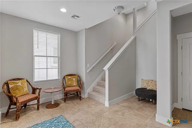 a bathroom with a toilet and shower