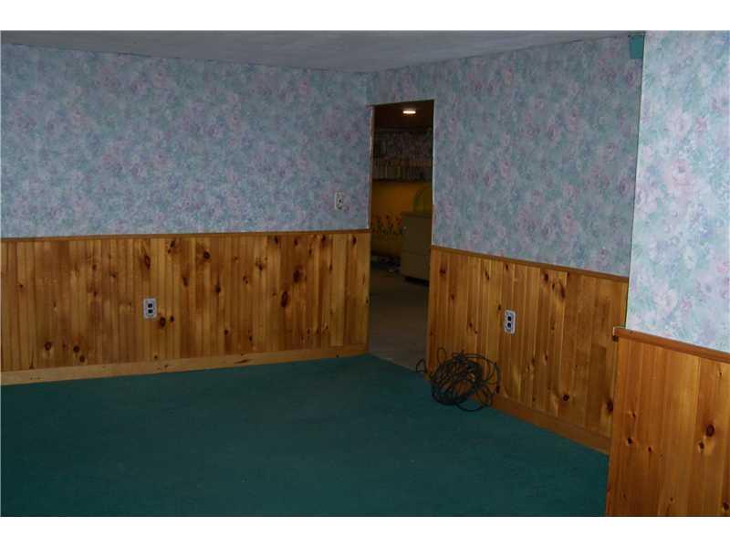 106 Taylor Road Pittsfield, ME 04967 - Photo 30 of 35 Bedroom. Bedroom in basement level.