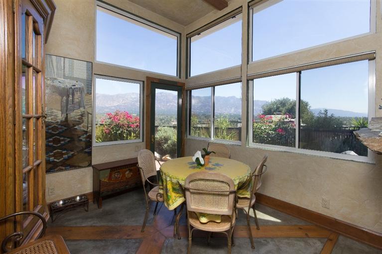 1131 Heatherside Road Pasadena, CA 91105 - Photo 14 of 44 a dining room with furniture and a floor to ceiling window