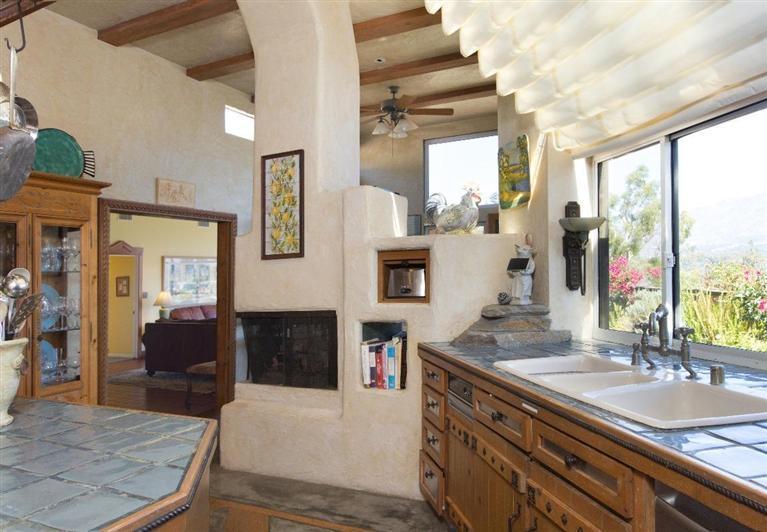 1131 Heatherside Road Pasadena, CA 91105 - Photo 16 of 44 a kitchen with stainless steel appliances granite countertop a sink and a counter space