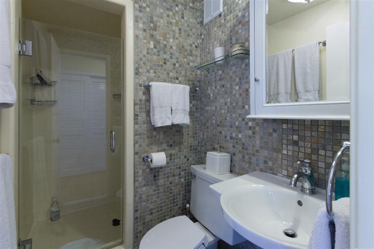 1131 Heatherside Road Pasadena, CA 91105 - Photo 17 of 44 a bathroom with a sink toilet and shower