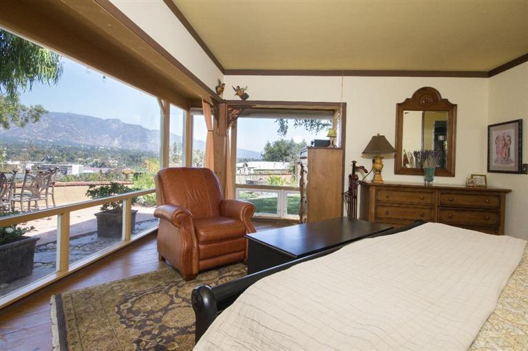 1131 Heatherside Road Pasadena, CA 91105 - Photo 28 of 44 a living room with furniture and a large window