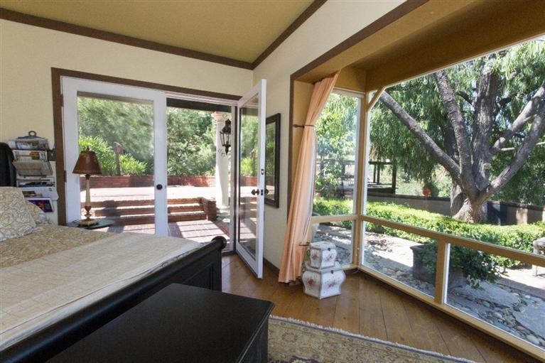 1131 Heatherside Road Pasadena, CA 91105 - Photo 35 of 44 a view of a room with balcony and wooden floor