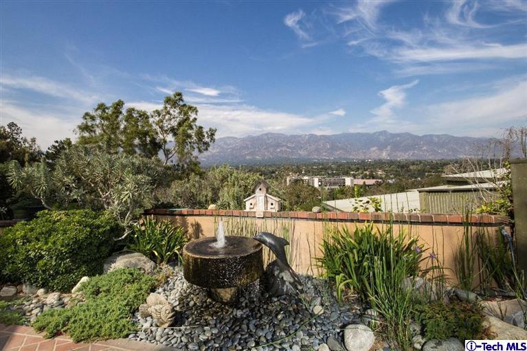 1131 Heatherside Road Pasadena, CA 91105 - Photo 37 of 44 a view of a lake with a mountain in the background