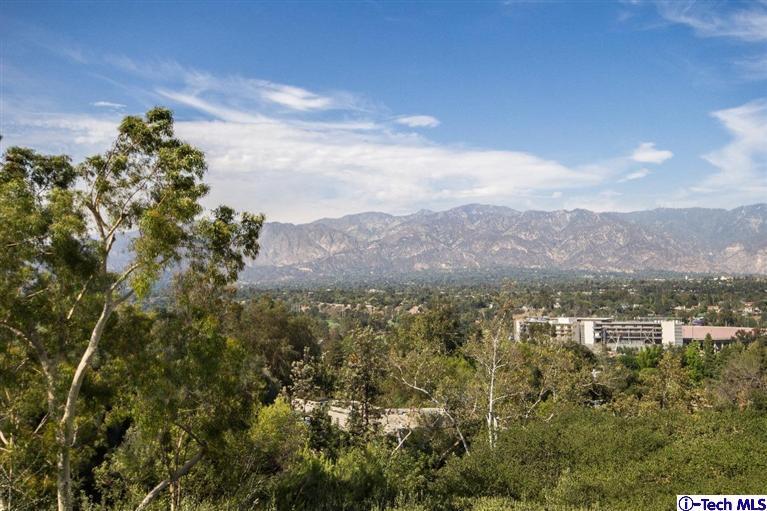 1131 Heatherside Road Pasadena, CA 91105 - Photo 38 of 44 a view of a city with lush green forest