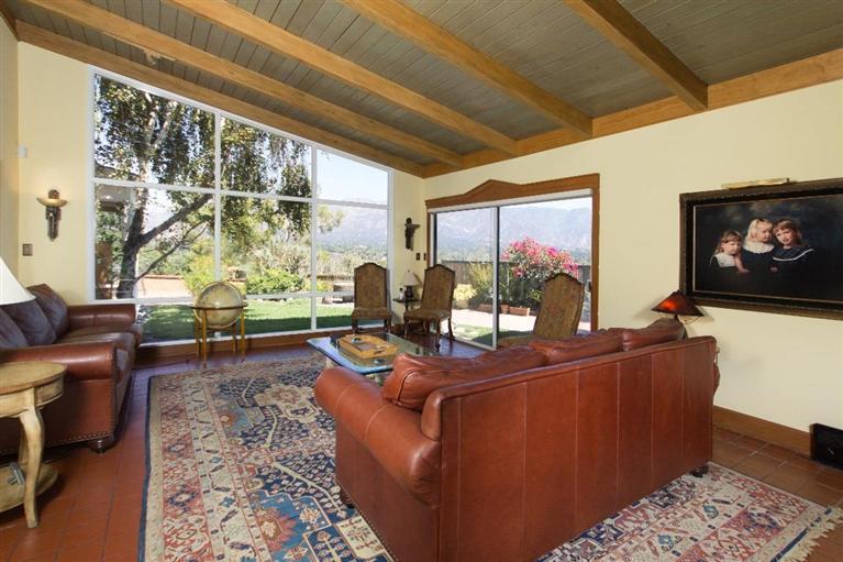 1131 Heatherside Road Pasadena, CA 91105 - Photo 10 of 44 a living room with furniture and a flat screen tv