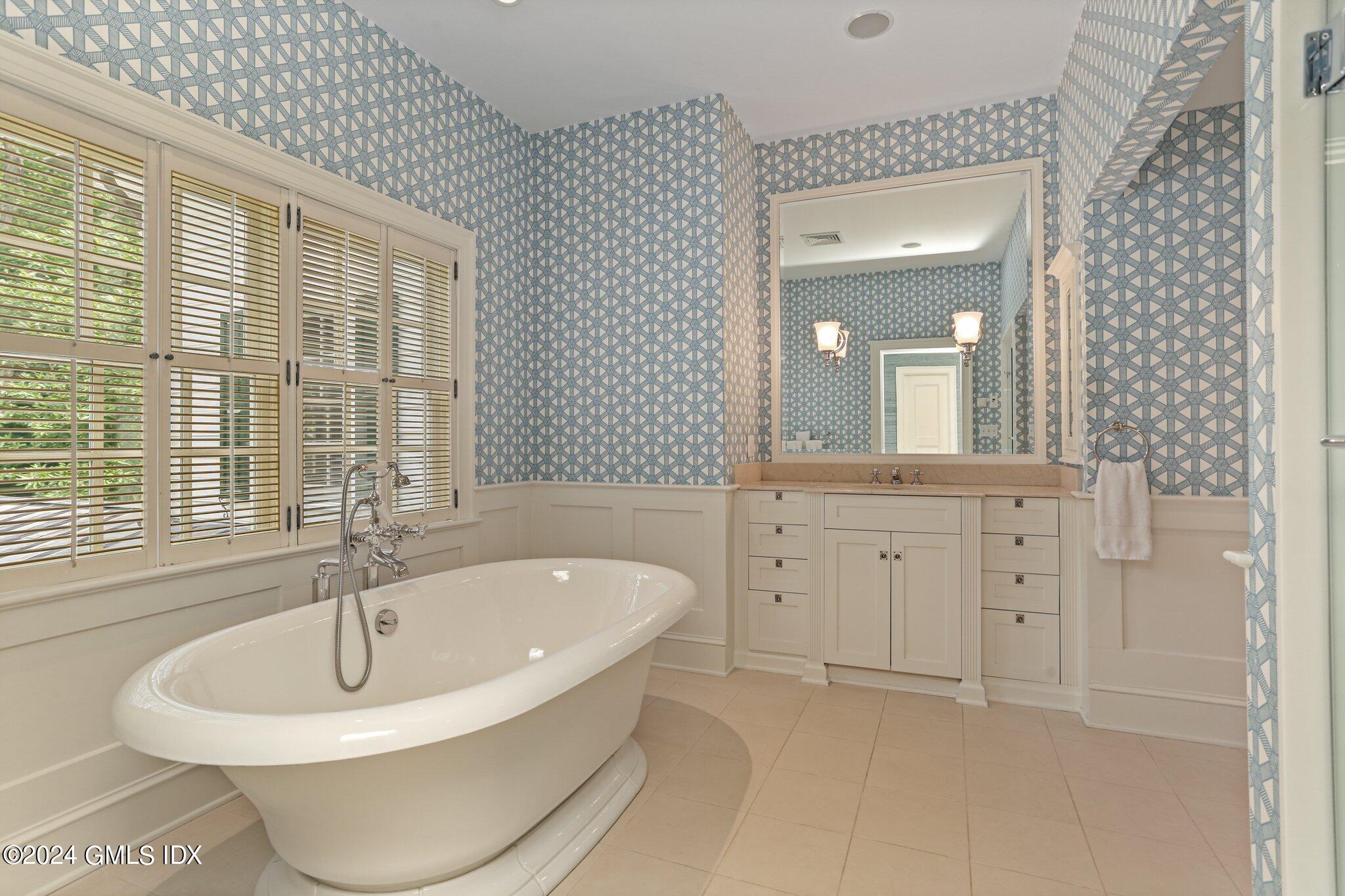 68 Rock Maple Road Greenwich, CT 06830 - Photo 24 of 46 a bathroom with a bathtub and a sink