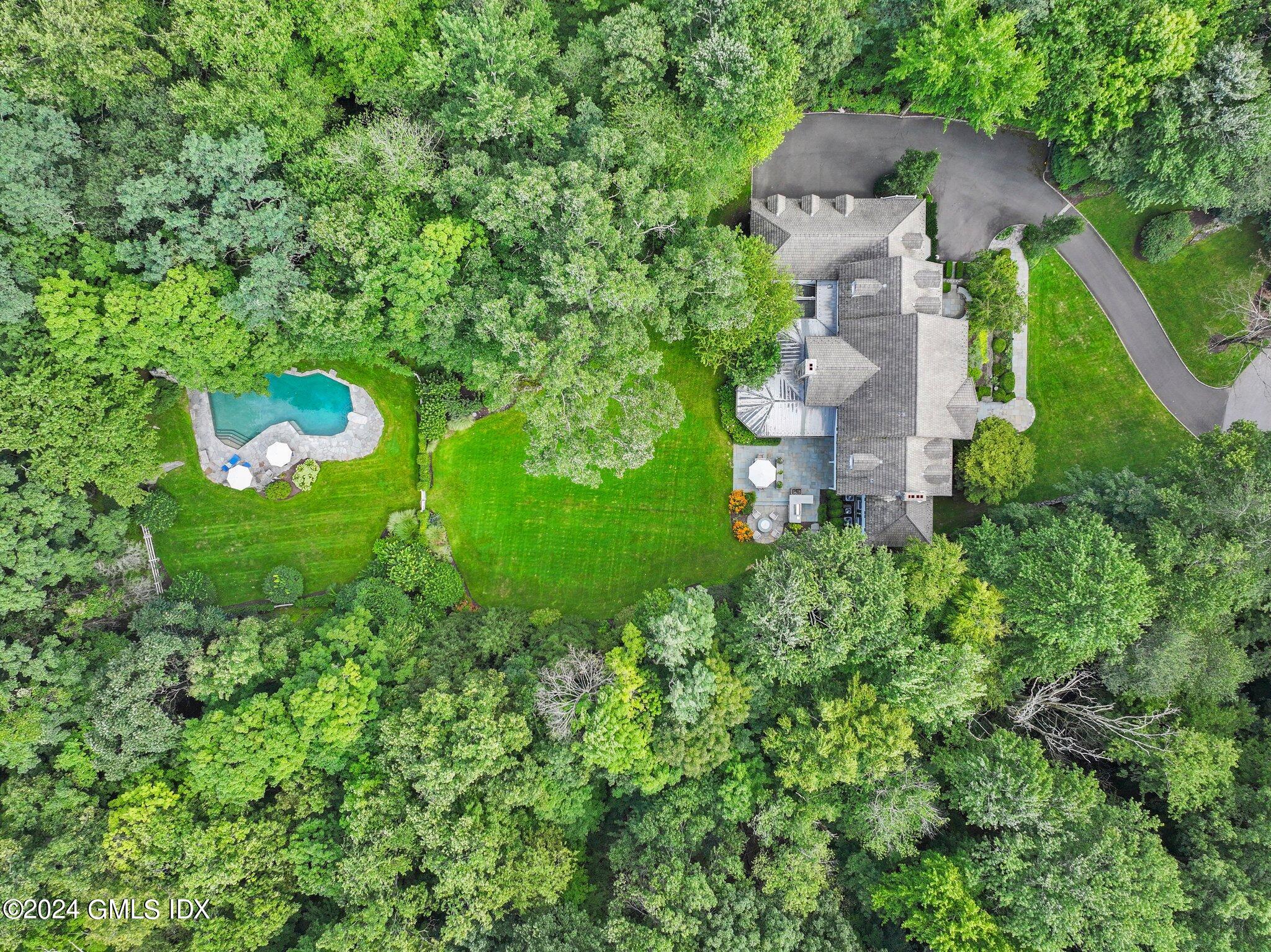 68 Rock Maple Road Greenwich, CT 06830 - Photo 39 of 46 an aerial view of a house with a yard