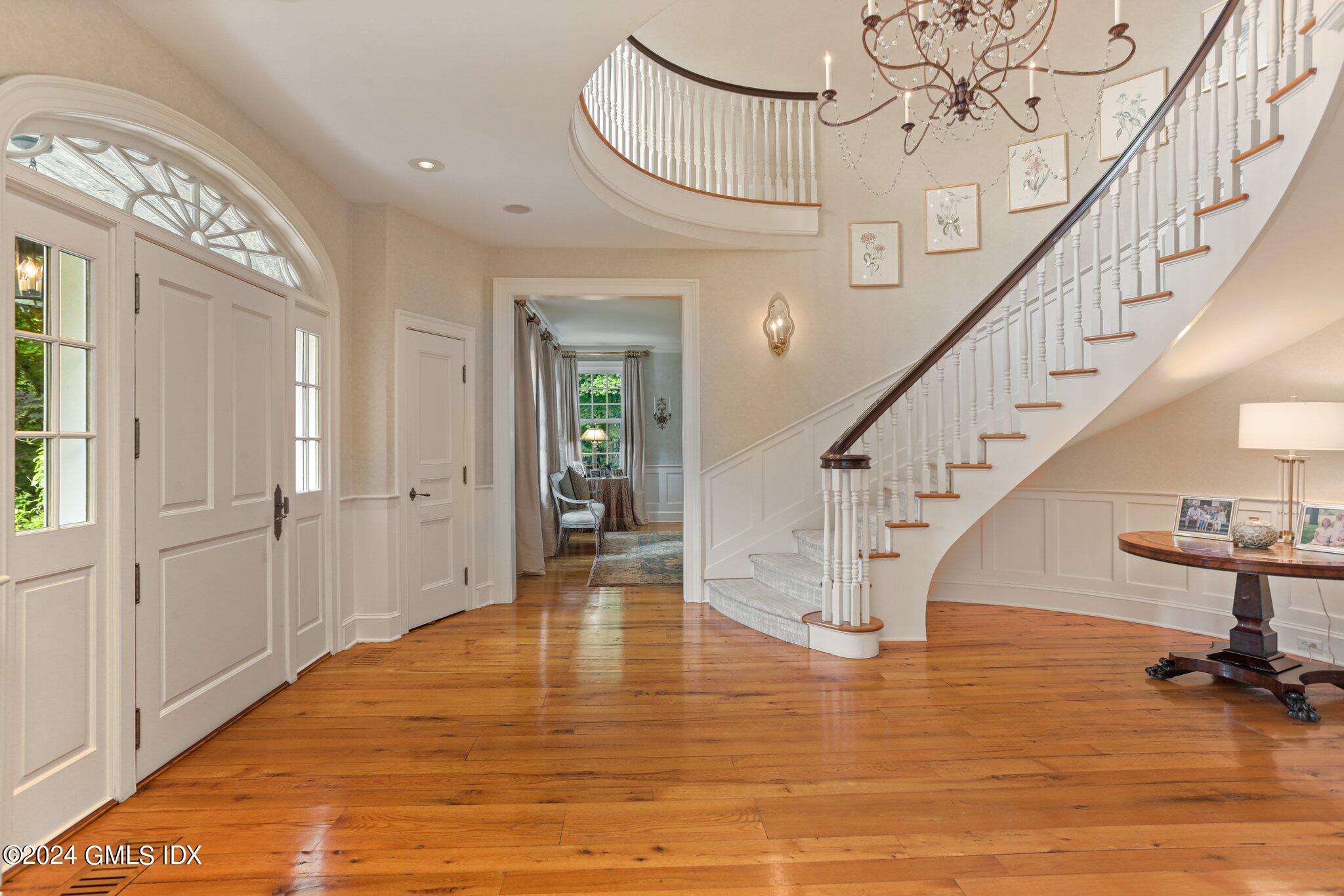 68 Rock Maple Road Greenwich, CT 06830 - Photo 5 of 46 a view of entryway and hall with wooden floor