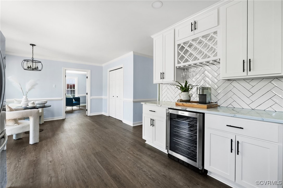 341 Rossmere Drive Midlothian, VA 23114 - Photo 12 of 41 a kitchen with stainless steel appliances a white cabinets and wooden floor