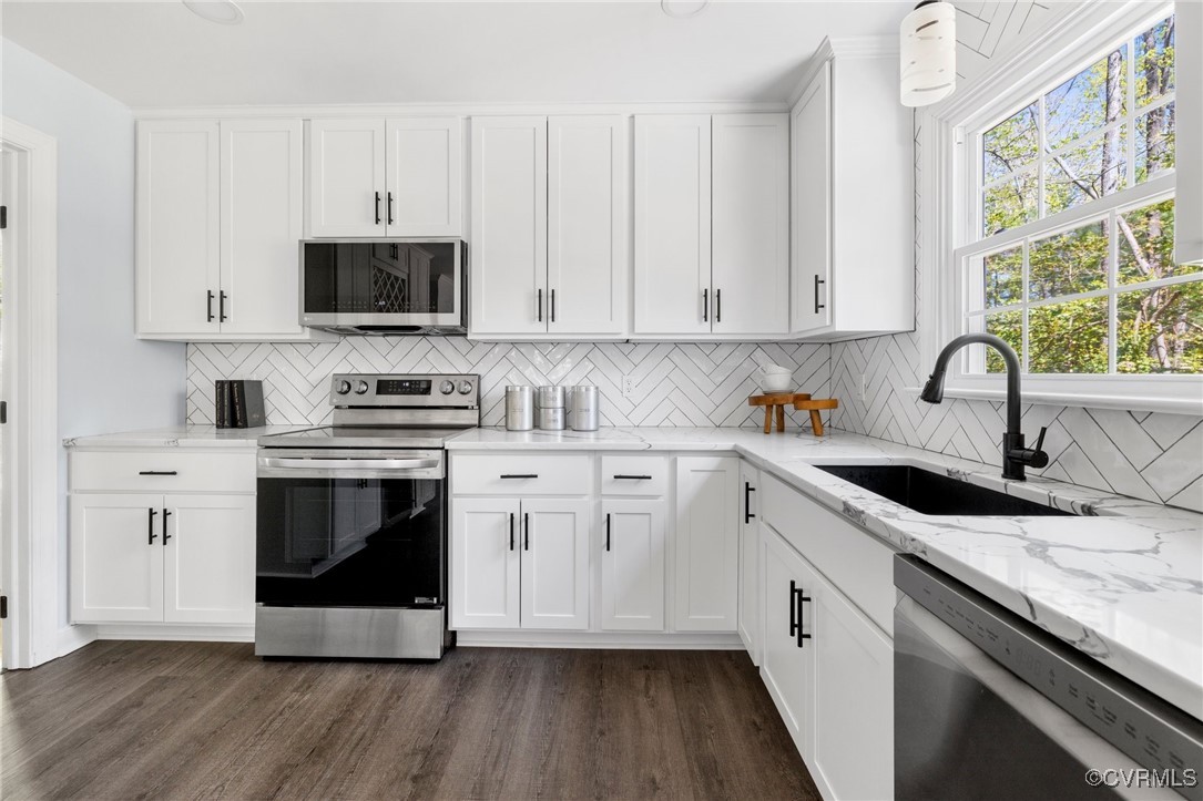 341 Rossmere Drive Midlothian, VA 23114 - Photo 13 of 41 a kitchen with stainless steel appliances granite countertop a sink a stove and cabinets