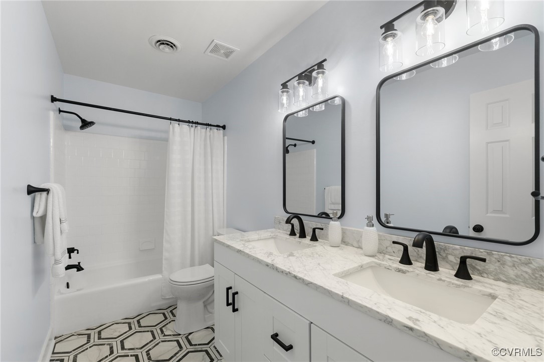 341 Rossmere Drive Midlothian, VA 23114 - Photo 24 of 41 a bathroom with a granite countertop sink mirror and a bathtub