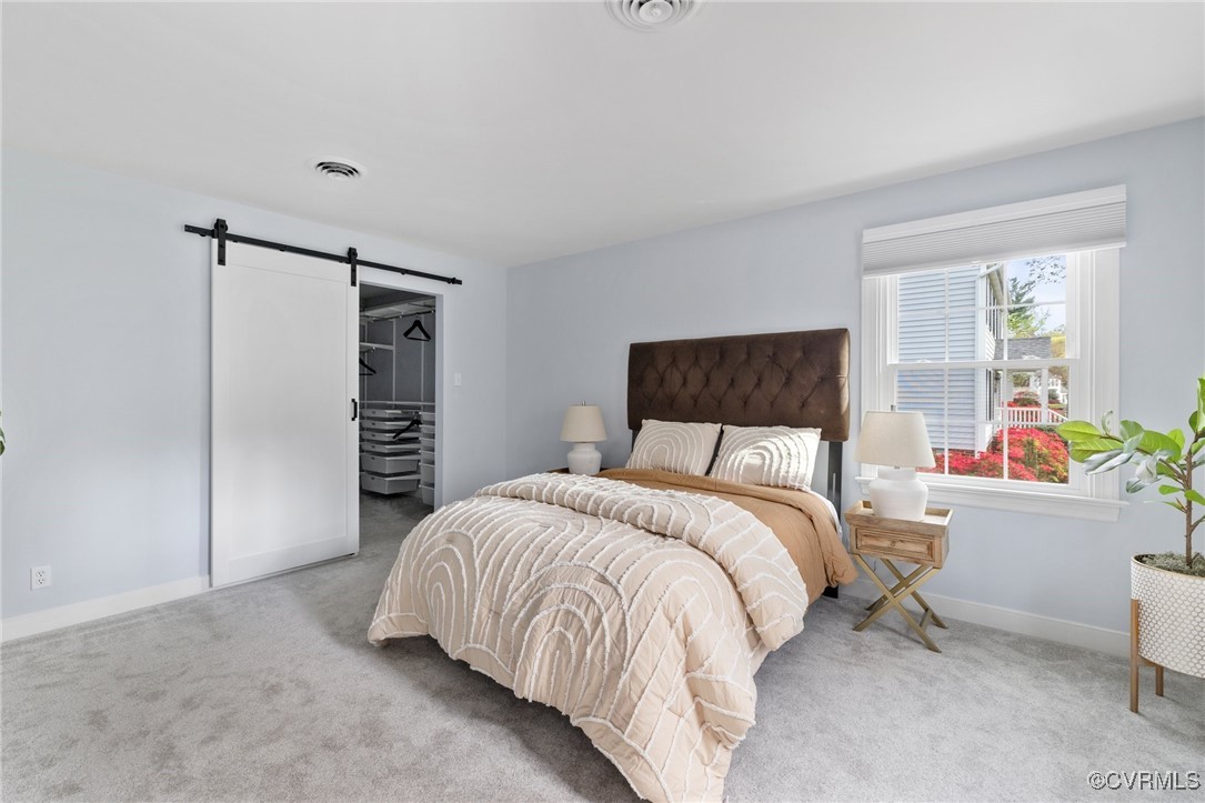 341 Rossmere Drive Midlothian, VA 23114 - Photo 27 of 41 a bedroom with a bed and a couch