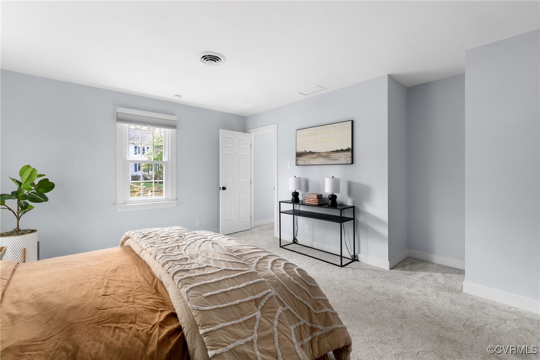 341 Rossmere Drive Midlothian, VA 23114 - Photo 28 of 41 a bedroom with a bed and a window