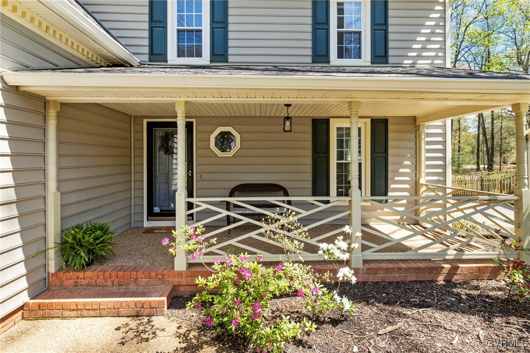 341 Rossmere Drive Midlothian, VA 23114 - Photo 3 of 41 a front view of a house with a yard