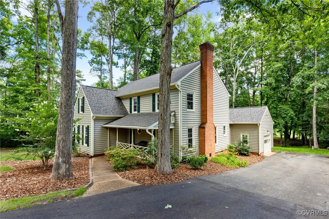 341 Rossmere Drive Midlothian, VA 23114 - Photo 4 of 41 front view of a house with a yard
