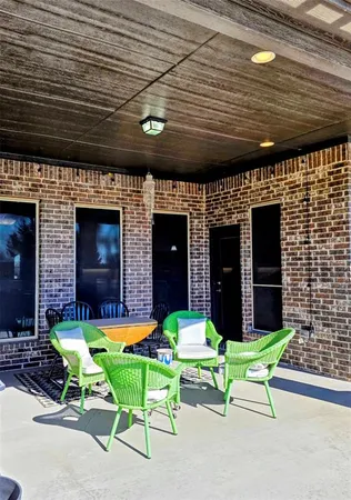 a view of a chairs in front of house