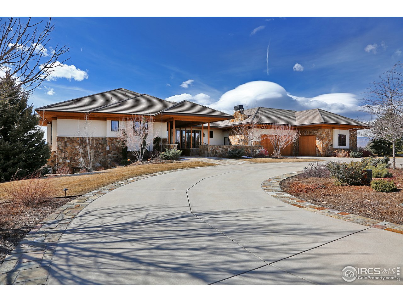 9455 Crystal Lane Longmont, CO 80503 - Photo 3 of 40 a view of a house with a yard
