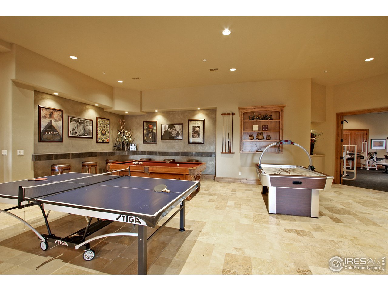9455 Crystal Lane Longmont, CO 80503 - Photo 35 of 40 a room with table tennis and air hockey table