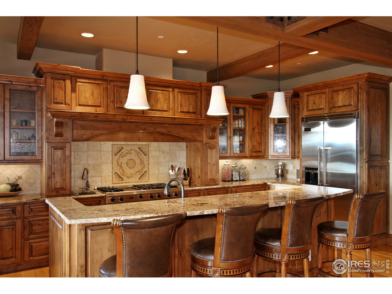 9455 Crystal Lane Longmont, CO 80503 - Photo 8 of 40 a kitchen with a sink and cabinets