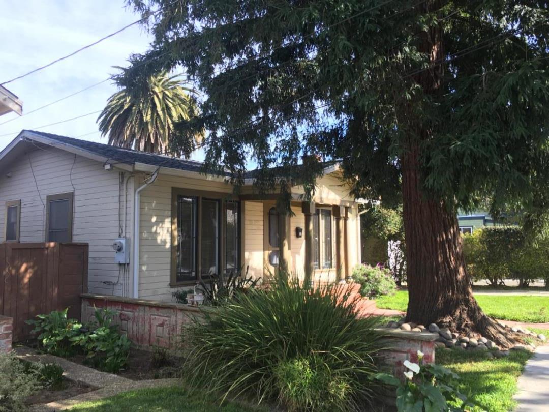 10 Bancroft Road Burlingame, CA 94010 - Photo 2 of 11 a front view of a house with a tree