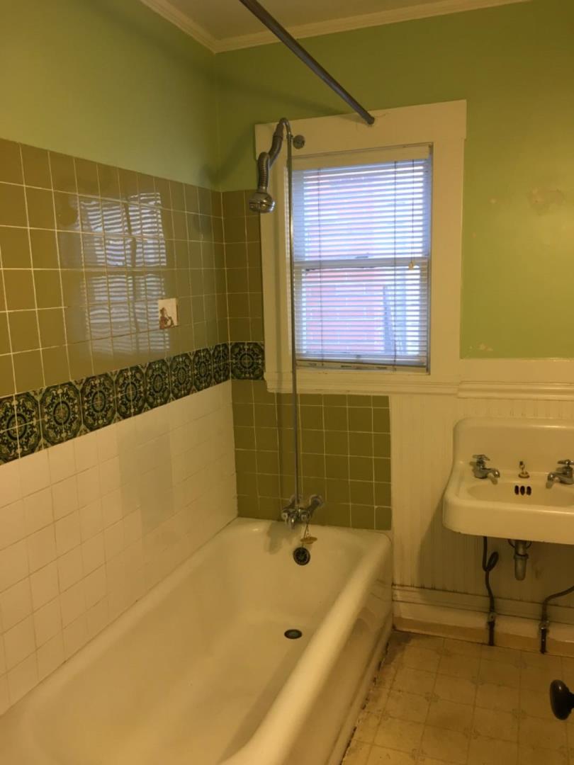 10 Bancroft Road Burlingame, CA 94010 - Photo 8 of 11 a bathroom with a bathtub and a shower