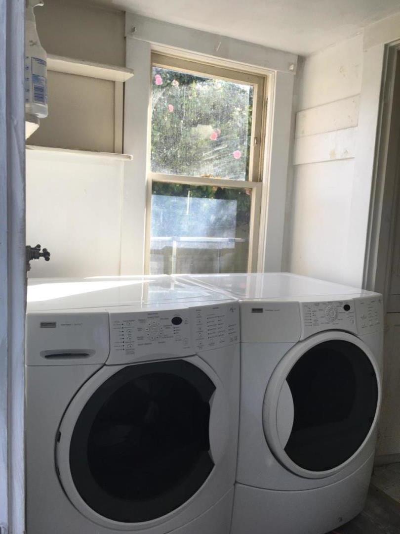10 Bancroft Road Burlingame, CA 94010 - Photo 9 of 11 a close view of a washer and dryer in a bathroom