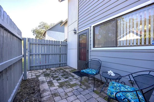 a view of a backyard with a patio