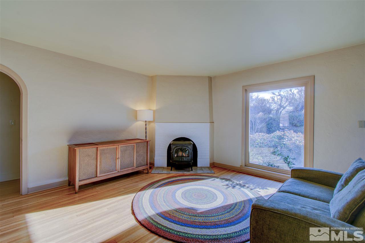 589 Reno Avenue Reno, NV 89509 - Photo 5 of 25 a living room with furniture and a fireplace