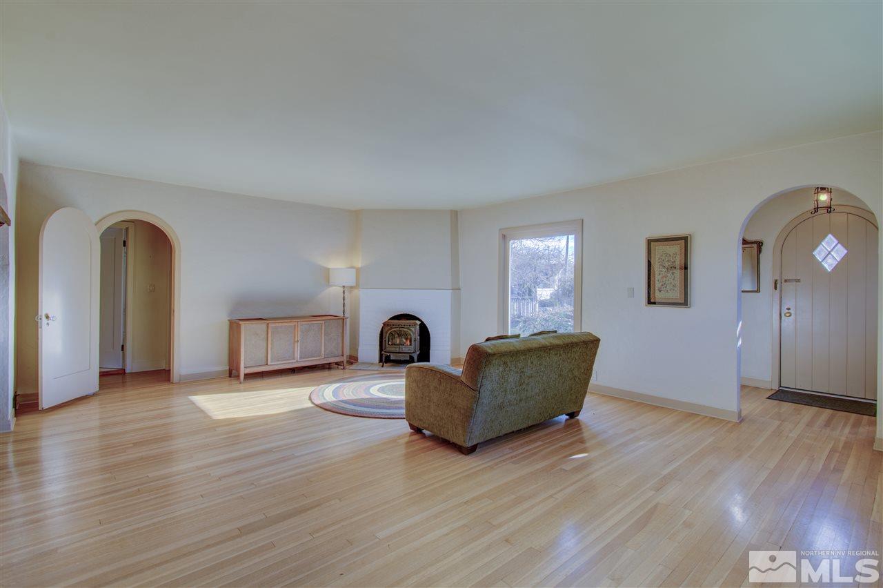 589 Reno Avenue Reno, NV 89509 - Photo 6 of 25 a living room with furniture and a potted plant
