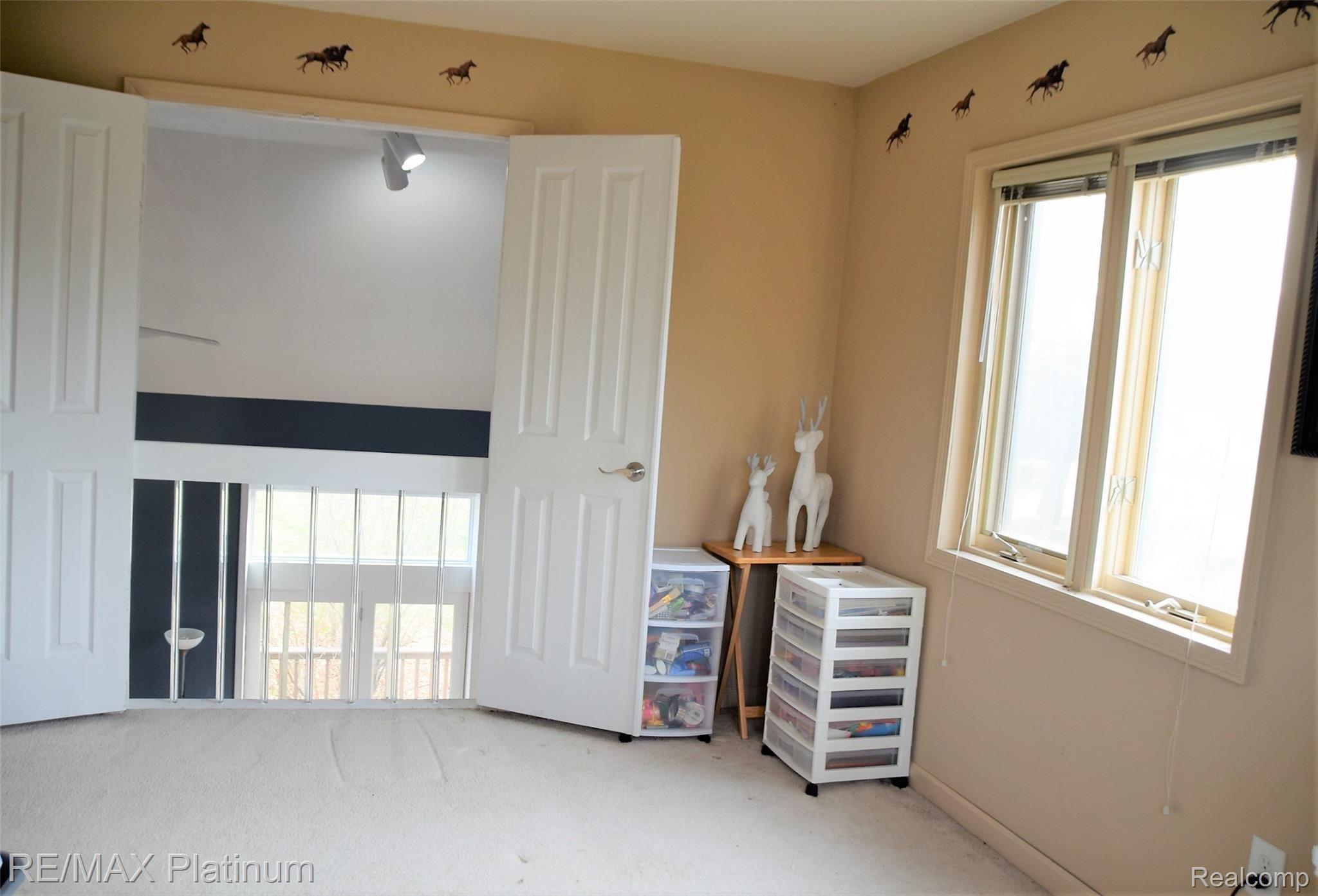 310 North Eager Road Howell, MI 48843 - Photo 23 of 35 bedroom 3 overlook.JPG