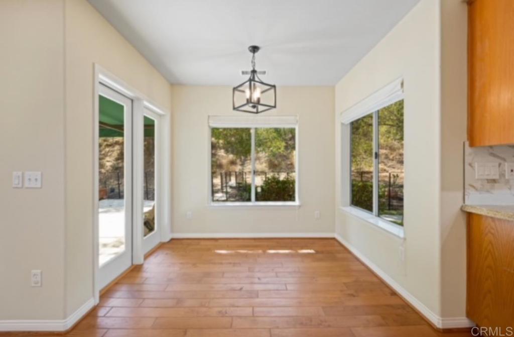 4009 Pala Mesa Oaks Drive Fallbrook, CA 92028 - Photo 13 of 45 a view of an empty room with windows